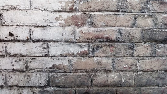 Bricks wall that represent the obsolete building system